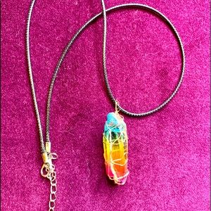 Wire wrapped crystal